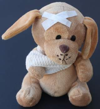 teddy bear wrapped in bandages